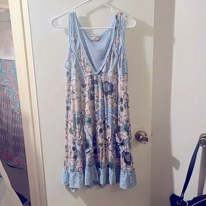 Size M free people floral dress w/pockets.